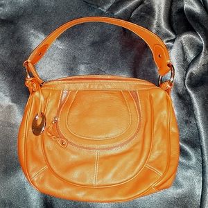 Franco Sarto Orange leather handbag.